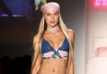 MIAMI BEACH, FL - JULY 22: A model walks the runway during the SWIMMIAMI Frankie's Bikinis 2018 Collection fashion show at the SWIMMIAMI tent on July 22, 2017 in Miami Beach, Florida. (Photo by Alexander Tamargo/Getty Images for SWIMMIAMI)