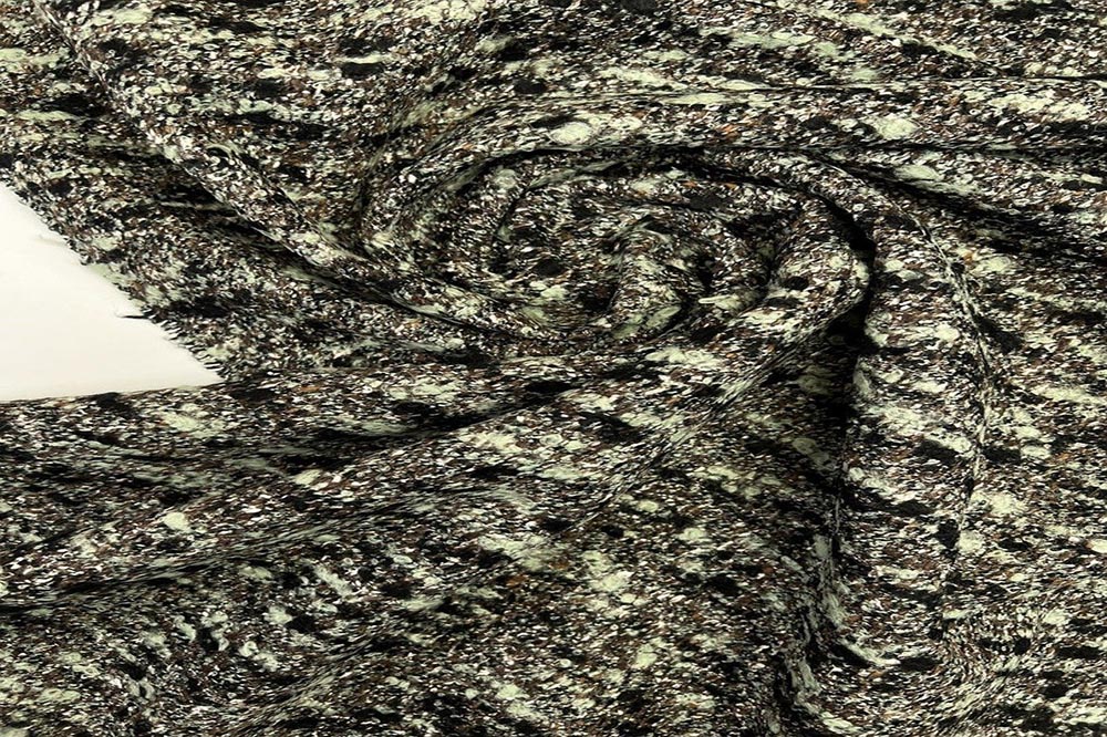 The Timeless Appeal of Bouclé Fabric in Fashion and Interiors